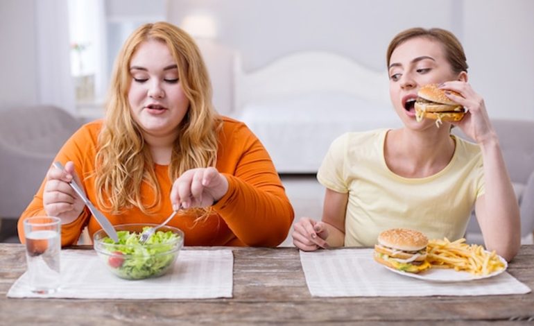 Fat and slim woman